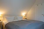 Schlafzimmer - Ferienpark Seepferdchen, Haus Hiddensee 22c - Top-Hundeurlaub