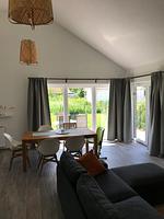 Wohnzimmer - Haus Carpe Diem - Top-Hundeurlaub