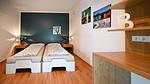 Schlafzimmer - Apartment 7/8 OG Gartenblick mit Balkon - Top-Hundeurlaub