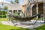 ChatGPT:Private Terrasse am Ferienhaus Nordkugel – mit Hängematte, Esstisch und Sonnenschirm für entspannte Stunden - Nordkugel - Top-Hundeurlaub