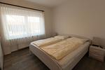 Schlafzimmer - Ferienwohnung Dat Ferienhus Norddeich Whg.1 - Top-Hundeurlaub
