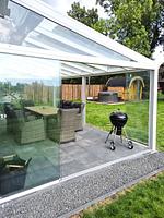 Überdachte Terrasse mit Sitzgruppe und Grill - Ferienhaus Kuestenliebe - Top-Hundeurlaub