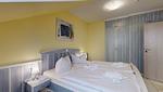 Schlafzimmer - Villa Strandperle 19 - Top-Hundeurlaub