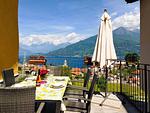 sonnige überdachte Terrasse mit großem Sonnenschirm - Paola - Top-Hundeurlaub