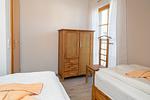 Schlafzimmer mit zwei Einzelbetten - Reihenhaus 6b - Schwalbe - Top-Hundeurlaub