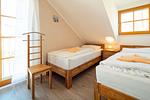 Schlafzimmer mit zwei Einzelbetten - Reihenhaus 6b - Schwalbe - Top-Hundeurlaub