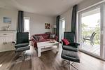 Wohn-Essbereich mit Couch-Ecke - Nordseeresort Friesland 50-3-s - Top-Hundeurlaub