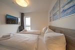 Schlafzimmer mit Doppelbett - Nordseeresort Friesland 50-3-s - Top-Hundeurlaub