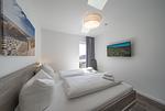 Schlafzimmer mit Doppelbett - Nordseeresort Friesland 50-3-s - Top-Hundeurlaub