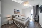 Schlafzimmer mit Doppelbett - Nordseeresort Friesland 50-3-s - Top-Hundeurlaub