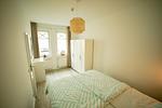 Schlafzimmer mit Doppelbett - Ferienwohnung Meehr Binz - Villa Strandburg - Top-Hundeurlaub
