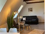 Wohnzimmer - Ferienwohnung Ole - Reet und Erholung - Ringsberg bei Glücksburg - Top-Hundeurlaub