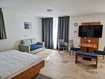 Wohnzimmer - Appartement "Blaukehlchen 2" mit Terrasse - 5* - Top-Hundeurlaub