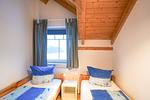 Kommen Sie in dieses gemütliche Schlafzimmer mit herrlichem Ausblick. - Salzwind IV - Top-Hundeurlaub