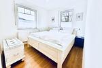 Schlafzimmer mit Kleiderschrank - Ferienwohnung blaue Koje - Top-Hundeurlaub