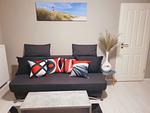 Wohnzimmer - Ferienwohnung Windsbraut Büsum - Top-Hundeurlaub