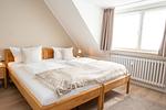 Schlafzimmer - Tunghörn Hüs Whg. 4, 1. OG - Top-Hundeurlaub