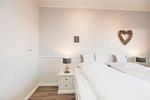 Schlafzimmer - Norderhoog Whg. 48 / 2.OG / O - Top-Hundeurlaub