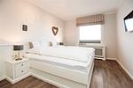 Schlafzimmer - Norderhoog Whg. 48 / 2.OG / O - Top-Hundeurlaub