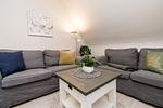 Wohnzimmer - Haus Marell 2 West - Top-Hundeurlaub