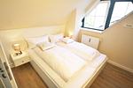 Schlafzimmer - Haus Käpt`n Hein Cors Whg. 4 OG/DG - Top-Hundeurlaub
