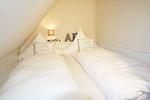Schlafzimmer - Haus Käpt`n Hein Cors Whg. 4 OG/DG - Top-Hundeurlaub