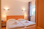 Schlafzimmer - Apartmenthaus Sonnenburg Ferienwohnung 12 - Top-Hundeurlaub