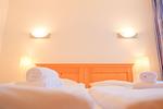 Schlafzimmer - Apartmenthaus Sonnenburg Ferienwohnung 12 - Top-Hundeurlaub