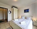 Schlafzimmer - Ferienwohnung am Salzhaff C6 - Top-Hundeurlaub