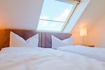 Bett - Ferienwohnung Haffblick im Haus am Yachthafen - Top-Hundeurlaub