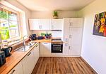 Küche / Küchenzeile - Ferienhaus Haffliebe mit Sauna und Kamin - Top-Hundeurlaub