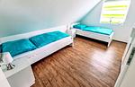 Schlafzimmer - Ferienhaus Haffliebe mit Sauna und Kamin - Top-Hundeurlaub