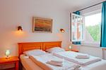 Schlafzimmer - Apartmenthaus Sonnenburg Ferienwohnung 16 - Top-Hundeurlaub