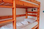 Schlafzimmer - Apartmenthaus Sonnenburg Ferienwohnung 16 - Top-Hundeurlaub