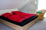 Schlafzimmer - Ferienwohnung Nest am Meer - Top-Hundeurlaub