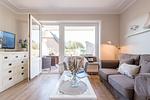 Wohnzimmer - Haus Norderstrasse 61, Whg. 6 - Top-Hundeurlaub