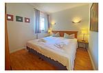 Schlafzimmer - Apartmenthaus Sonnenburg Ferienwohnung 7 - Top-Hundeurlaub