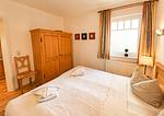 Schlafzimmer - Apartmenthaus Sonnenburg Ferienwohnung 7 - Top-Hundeurlaub
