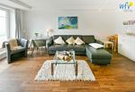 Wohnzimmer - Ferienwohnung Südperle - Top-Hundeurlaub
