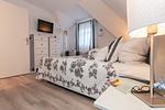 Schlafzimmer - Birkenstraße 11c Haus 3 - Top-Hundeurlaub