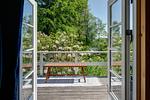 Terrasse am Ferienhaus Peaceful Getaway – gemütlicher Sitzplatz im Garten in Südschweden - Peaceful Getaway - Top-Hundeurlaub