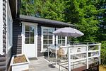 Terrasse mit Sitzplatz am Ferienhaus Peaceful Getaway – Außenbereich für entspannte Urlaubstage - Peaceful Getaway - Top-Hundeurlaub