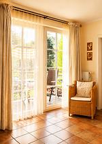Wohnzimmer - Ostseewelle Ferienwohnung 13 - Top-Hundeurlaub