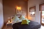 Schlafzimmer - Dominique - Feriendorf Via Claudia Haus 100 - Top-Hundeurlaub