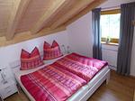 Schlafzimmer - Platzhirsch - Feriendorf Via Claudia Haus 78 - Top-Hundeurlaub