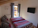 Schlafzimmer - Platzhirsch - Feriendorf Via Claudia Haus 78 - Top-Hundeurlaub