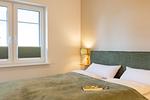 Ferienwohnung Wiese/Haus Queller in Wittdün/Amrum   Doppelbett mit Leselampe - Wiese - Das Queller - Top-Hundeurlaub