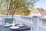 Terrasse mit Tisch und Blumen - Nathalie - Top-Hundeurlaub