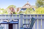 Terrasse mit Tisch und Gartenblick - Nathalie - Top-Hundeurlaub