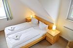 Schlafzimmer 1 - Ferienhaus Boddenperle in Glowe - Top-Hundeurlaub